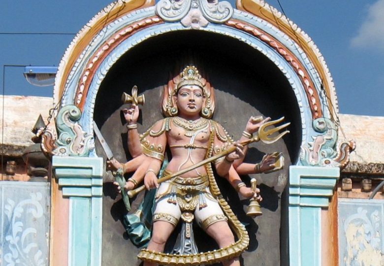 kalabhairava sculpture on top of his temple shrine